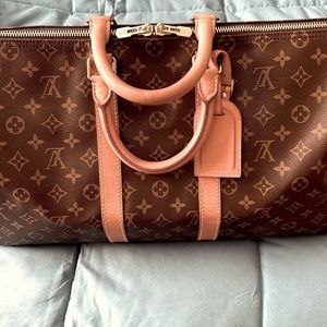 Fabulous authentic Louis Vuitton travel tote !!